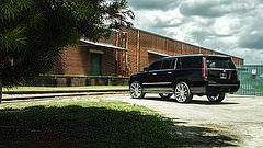обои черный Cadillac Escalade