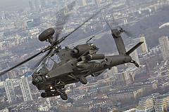 обои Apache над городом